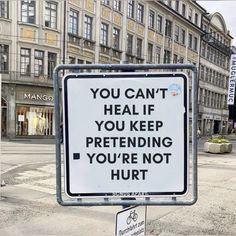 a sign that says you can't heal if you keep pretending you're not hurt