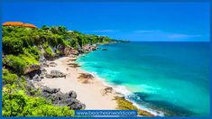 the beach is surrounded by lush vegetation and blue water