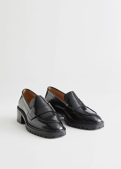 Classic leather penny loafers with an almond-shape toe, chunky block heels and texturised rubber soles. Heel height: 5.5cm / 2.1." Loafer Outfits, Buckle Loafers, Chunky Loafers, Sandro Paris, Chunky Block Heels, Black Loafers, Penny Loafer, Leather Chelsea Boots, Heeled Loafers