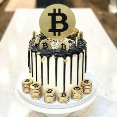 a cake decorated with bitcoins and gold coins