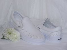 Romantic and elegant, our hand embellished white pearl wedding Vans are perfect for brides on the big day. This design can be personalised for that extra special touch - Please message for details. Orders are taken in UK sizes. An International sizing conversion chart is included in the listing for reference. Please make sure you order your size correctly due to the bespoke nature of the shoes. If you are in any way unsure of sizing please message me and I will be more than happy and available to answer any questions you have prior to purchasing. Bride Vans Shoes, White Pearl Embroidered Wedding Shoes, Bridal Vans, Vans Wedding, Bride Sneakers, Wedding Vans, Wedding Platform, Platform Vans, Frilly Socks