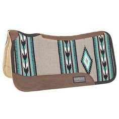 a brown and blue saddle pad with an southwestern design on the front, featuring a horse's head