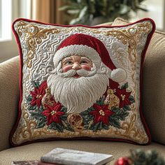 a santa clause pillow sitting on top of a couch