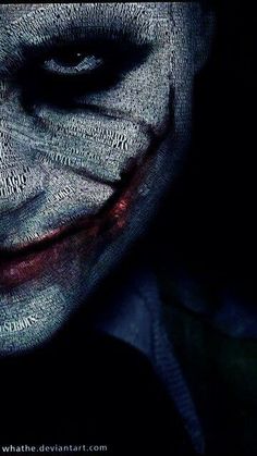 a close up of the face of a joker