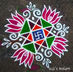 a colorful flower design painted on the ground