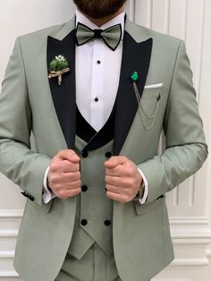 Suit Material: 65% Polyester, 32% Viscose, 3% Lycra Machine Washable: No Fitting: Slim-fit Cutting: Single Button, Double Slits Package Include: Jacket, Vest, Pants Gifts: Tie and Chain Dry Clean Only Tuxedo Colors, Green Tuxedo, Pants Gift, Groom Tuxedo, Slim Fit Tuxedo, Men Stylish Dress, Lapel Jacket, Detachable Collar, Looking Dapper