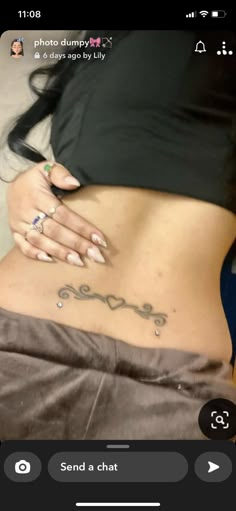 a woman's stomach with the word love written on it