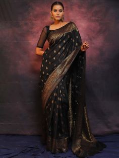 Banarasi soft lichi silk black saree for women, jacquard saree with fancy zari work, new wedding saree for bridesmaid,trendy festival saree  Saree Details:  Saree Color: 1) Black 2) Nile Blue  Saree Length: 5.5 Meter Saree Fabric: Banarasi soft lichi silk Saree Work : Pure Copper zari weaving beautiful Jacquard work Blouse Details : Blouse Color: Matching. Blouse Length: 0.8meter Blouse Fabric : Banarasi soft lichi silk Blouse Work : Heavy Brocade blouse. Blouse wear by model is just for modelin Black Art Silk Pre-draped Saree With Zari Weaving, Festive Black Pre-draped Saree With Self Design, Semi-stitched Black Art Silk Blouse Piece, Black Pre-draped Saree For Festivals With Unstitched Blouse, Black Pre-draped Saree With Pallu For Festive Occasions, Black Bollywood Handloom Pre-draped Saree, Elegant Black Dola Silk Blouse Piece, Black Handloom Pre-draped Saree For Festivals, Black Pre-draped Saree With Zari Weaving For Puja