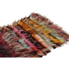 multicolored shaggy rug on white background