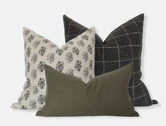 four pillows with different patterns on them