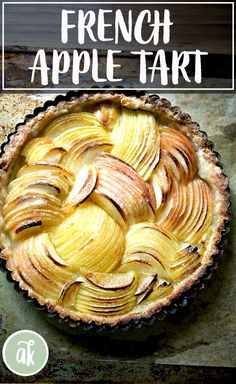 an apple tart with the words french apple tart on top and below it