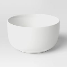 a white bowl sitting on top of a table