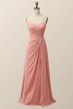 a pink dress on a mannequin dummy