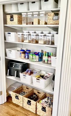 an organized pantry with bins and baskets