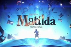 the title for matilda is shown in front of an open book with letters floating around it