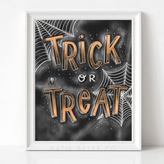 a trick or treat poster with spider webs on the front and orange lettering that reads trick or treat