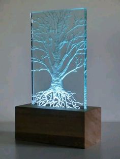 a glass block with a tree on it