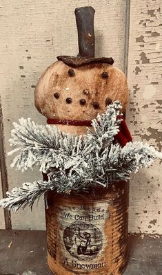 an old fashioned christmas decoration in a bucket