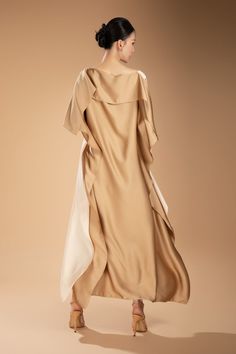 Made from a luxurious silk blend, this ankle-length dress offers a sophisticated and elegant look. Its boat neck design adds a touch of class, making it perfect for any occasion. Experience this timeless and versatile piece in your wardrobe.  Length: From 125cm to 130cm Gold Silk Midi Dress For Formal Occasions, Pre-draped Silk Crepe Maxi Dress, Cream Silk Midi Dress For Evening, Cream Silk Evening Midi Dress, Elegant Silk Bias-cut Maxi Dress, Silk Beige Evening Midi Dress, Elegant Silk Crepe Dress For Formal Occasions, Elegant Bias Cut Silk Maxi Dress, Beige Silk Bias Cut Dress