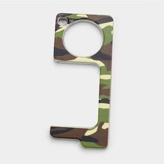 the letter c is made out of camouflage