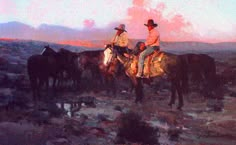 two men are riding horses in the desert