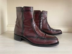 To view the full description for this vintage item, please expand the listing ♥️ Authentic vintage '70s oxblood leather boots! Gorgeous vintage footwear. Genuine leather uppers, quarter lining and sole.  Look nearly new with a teeny bit of wear down to heel cap- tons of lift left, barely noticeable. interiors are clean, scuffing on soke expected from light wear. Zippers work fine. Made in India, marked size 7D. (Men's) I wear a women's 7.5-8M and these feel a size too big in my foot. I think they are the equivalent of a women's 8 but please check measurements. (D with in men's shoes is a medium width) Toe to heel at sole: 11" Tie to heel inside the boot: approx 10.5" Width of sole at ball of foot: 3 5/8" ♥️ Thank you for visiting! All sales on vintage are final, no returns or order cancell 70s Boots, 70s Shoes, Boots Fit, Womens Booties, Oxblood Leather, Shoes Hack, Booties Ankle Boots, Heel Caps, Boot Shoes Women