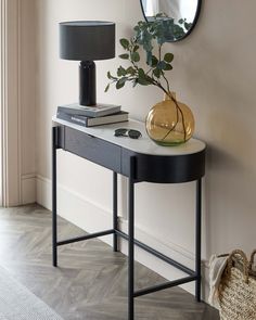 Elegant modern console table with a sleek black finish, featuring a smooth rectangular top and a sturdy metal frame with straight legs. Console Coffee Bar, Console Table Hallway Decor, Black Console Table Styling, Black Hallway Table, Small Console Table Decor, Dressing Table Styling, Console For Bedroom