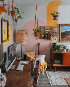 a living room filled with furniture and decor