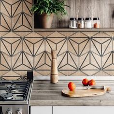 a kitchen counter with some tomatoes on it