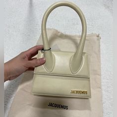 Brand New With Tag And Dustbag. Ivory Color. Approx. 7.1"H X 5.5"W X 2.8"D Jacquemus Bag Medium, Van Cleef Aesthetic, White Jacquemus Bag, Jacquemus Bag Cream, Jacquemus Bag Le Chiquito, Jacquemus Small Bag, Bags Jacquemus, Jacquemus Le Chiquito Moyen, Le Chiquito Moyen