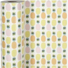 a roll of paper with pineapples on it