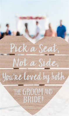 a wooden sign that says pick a seat not a side you're loved by both the groom and bride