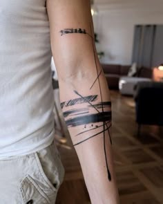 a person with a tattoo on their arm