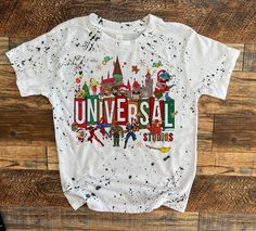 "Universal studio christmas family vacation shirts, bleach washed universal hollywood tees Match with color instead of style! To see other bella canvas marbled styles click here: https://www.etsy.com/Mamapower/listing/635114990/disney-shirts-disney-womens-shirt-ladies?utm_source=Copy&utm_medium=ListingManager&utm_campaign=Share&utm_term=so.lmsm&share_time=1538780242127 For boys you can checkout our matching color scheme shirts! https://www.etsy.com/Mamapower/listing/681104331/boys-disney-shirt-d Christmas Universal Studios Outfit, Universal Shirts For Family, Universal Studio Family Shirts, Christmas Universal Shirts, Universal Studio Tshirt Ideas, Harry Potter Shirts For Universal Christmas, Universal Studios Christmas, Boy Disney Shirts, Orlando Christmas