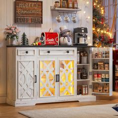 a christmas tree is in the corner of a room with an old fashioned buffet and coffee maker