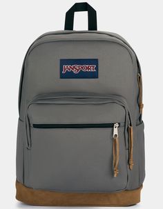 the jansport backpack is grey with brown trim and has a name tag on it