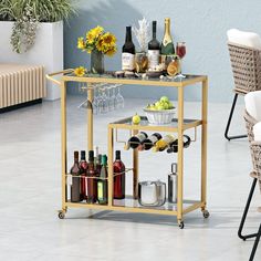 a bar cart filled with bottles and glasses