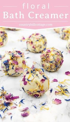 homemade floral bath cremer balls on a white surface with pink and yellow flowers