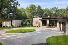 a large driveway in front of a house