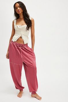 A go-to pair for comfy moments, these joggers from Intimately are featured in the perfect oversized fit and soft cotton blend. **Fit:** Relaxed, mid-rise, oversized **Features:** Soft cotton blend, terry lining, drop-crotch silhouette, elastic waistband with drawstring, cinched ankles, side pockets **Why We | Don't Wait Up Joggers by Intimately at Free People in Red, Size: M Fashion Joggers, Bottom Clothes, Boho Clothing, Boho Outfits, Bottoms Pants, Oversized Fits, Harem Pants, Elastic Waistband, Mid Rise