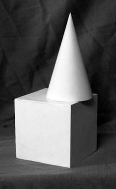 a black and white photo of a cube with a cone on top