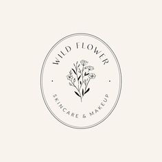 the logo for wild flower skin care and makeup, which is designed to look like flowers