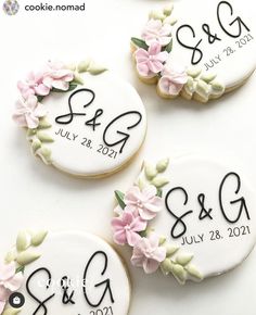 three decorated cookies with the names and date on them