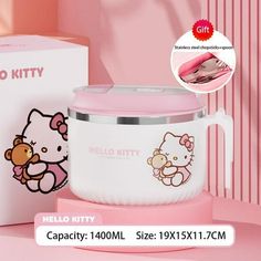 the hello kitty ice cream maker is in front of a pink box and it's packaging