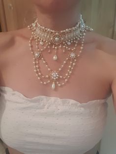 Luxury Ornate Jewelry With Intricate Design, Luxury Baroque Jewelry For Opera, Luxury Jewelry With Historical Baroque Design, Elegant White Pearl Charm Choker, Elegant White Choker With Pearl Charm, White Pearl Drop Choker Jewelry, Elegant Pearl Embellished Choker, White Pearl Choker Jewelry, Elegant Pearl Embellished Choker Jewelry