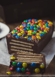 there is a chocolate cake with candy on it