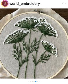 the embroidery is being worked on by someone who has just finished it and they are all done