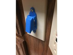 a blue object is hanging on the wall