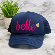 "These unique custom MADE TO ORDER hats are truely one of a kind. Not all heads are created equal , which is why we have so many size options. You can customize your hat color, size and your favorite design. please note all hat colors vary by size, in other words- not every hat color is available in every size. **personalize any name- boy or girl! Leave a note in the comments at check out what name you want and what font number you want and also if you want a heart added to the name** Please fee Customizable Custom Baseball Cap With Curved Bill, Customizable Cap Hats, Personalized Pink Trucker Hat, Fun Personalized Pink Trucker Hat, Customizable Fun Style Trucker Hat Snapback, Personalized Pink Snapback Trucker Hat, Customizable Fun Style Snapback Trucker Hat, Customizable Fun Snapback Trucker Hat, Customizable Curved Bill Trucker Hat As Gift