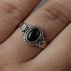 Genuine Black Onyx Ring, Black Onyx Silver Ring, Black Onyx Sterling Silver Ring, Black Onyx Statement Ring, Boho Silver Ring, Black Ring Metal: 925 Sterling Silver Gemstone : Black Onyx Stone Color : Black Stone Shape : Oval Stone Setting: Bezel Benefits of wearing Black Onyx:- Black onyx crystals can be used for grounding, protection, and self-control, and as a shield against negative energy. It also enhances discipline, allowing more ease in following through on goals and completing tasks. .. Oval Black Enamel Ring, Vintage Onyx Black Rings, Gothic Black Oval Jewelry, Black Oval Gothic Jewelry, Black Onyx Crystal Ring With Gemstone, Unique Silver Onyx Rings, Black Onyx Gothic Rings, Gothic Black Onyx Rings, Elegant Onyx Crystal Ring With Gemstone Details